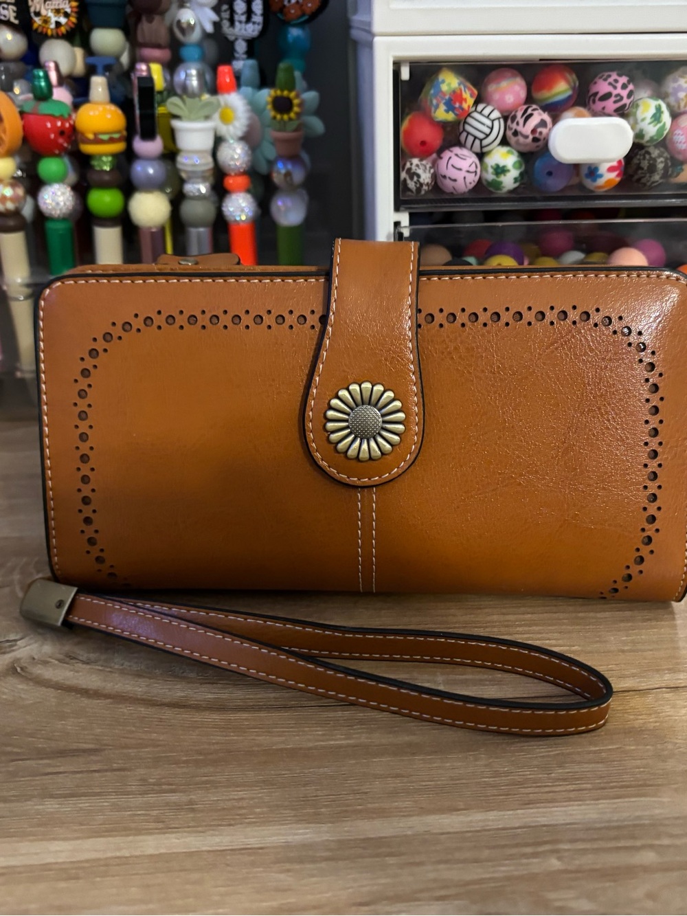 Tan Leather Wristlet Wallet with Decorative Daisy Snap